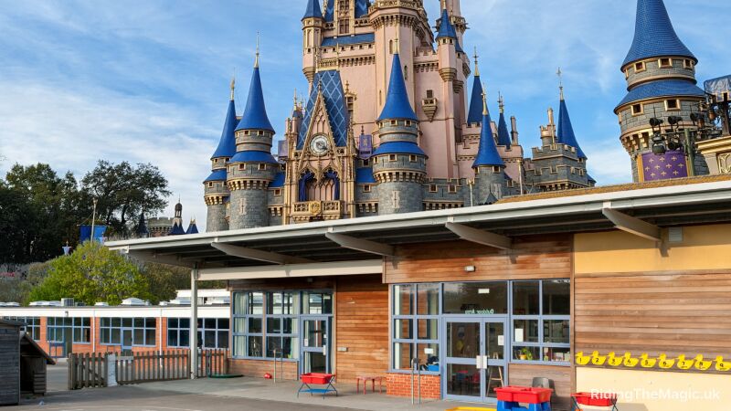 A primary school sits in the shadow of the castle from Magic Kingdom