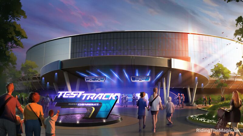 The Test Track building at EPCOT with new signage and people walking towards the building