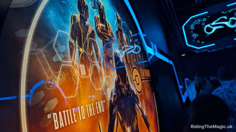 Signage from the TRON queue saying Battle to the End