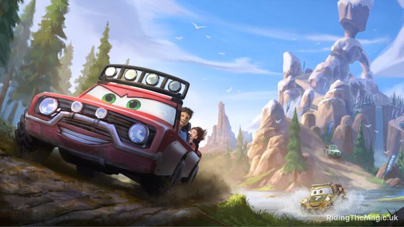 Three cars driving across a wilderness landscape with mountains and forrest in the background