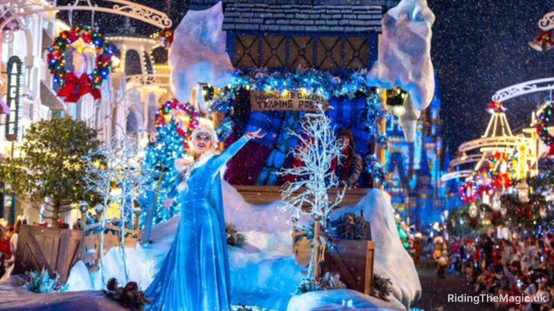 A Christmas parade float with a woman in a blue dress and a Christmas tree