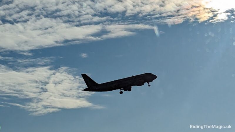 plane taking off against blue sky
