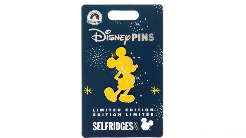 Disney pins limited edition pin with Mickey Mouse on the front of a navy blue card