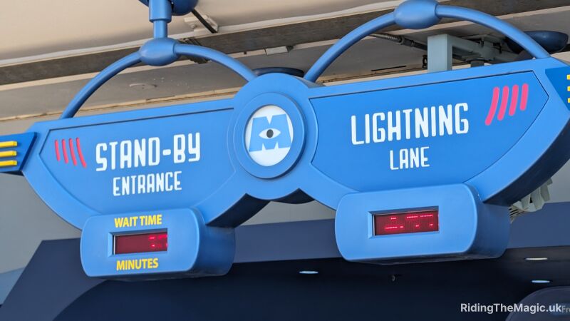 Sign for stand-by entrance for Lightning Lane at Disney World showing 53 minutes wait time