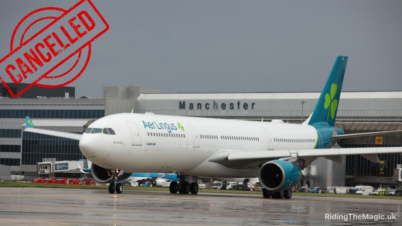 Aer Lingus airplane on the runway with a cancelled sign in the foreground