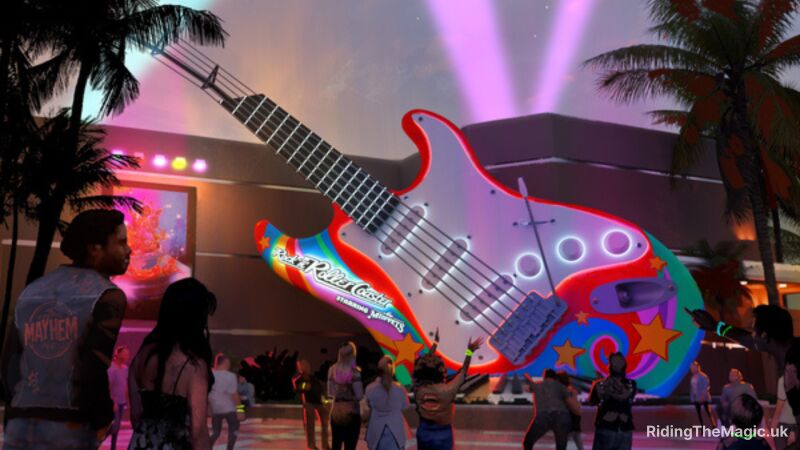 A large guitar is lit up at night with people walking around it