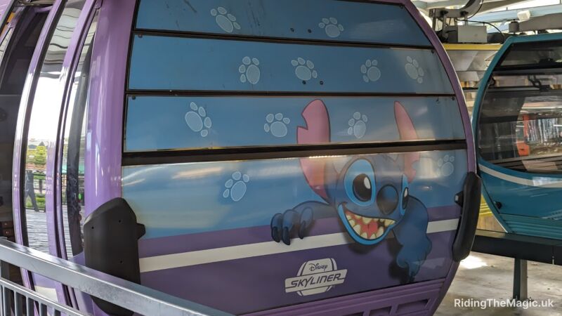 Purple skyline gondola with blue wrap stitch paw prints