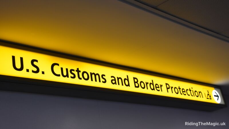 A yellow sign that says "U.S. Customs and Border Protection"